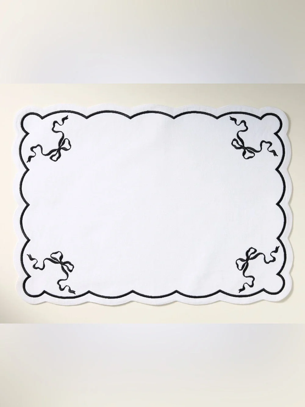 nwt set of 2 Anthropologie Benedita Black Bow Placemats